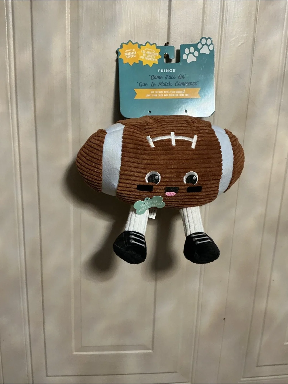 Fringe  Football - Game Face On , Clinker & Squeaky Plush Dog Toy With Legs 10”